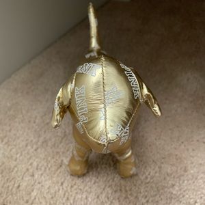 VS pink gold plush dog